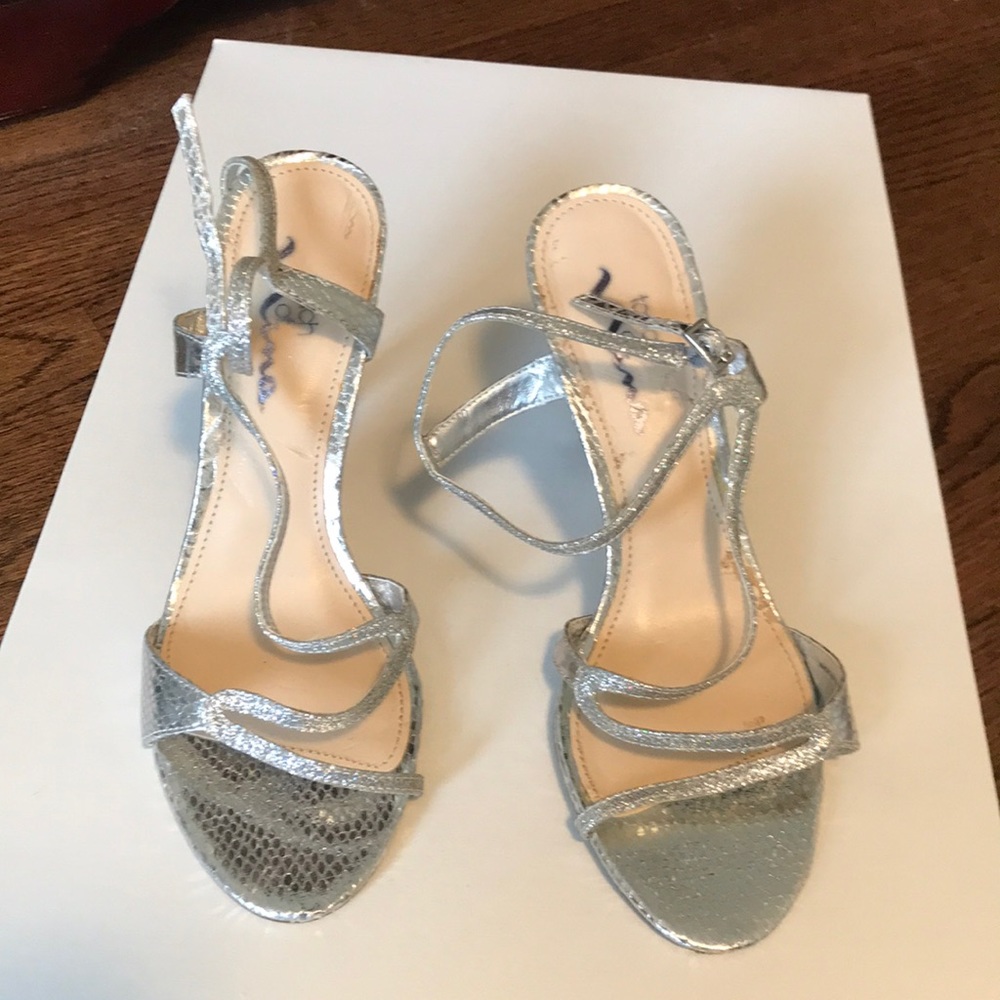 Strappy silver high heels